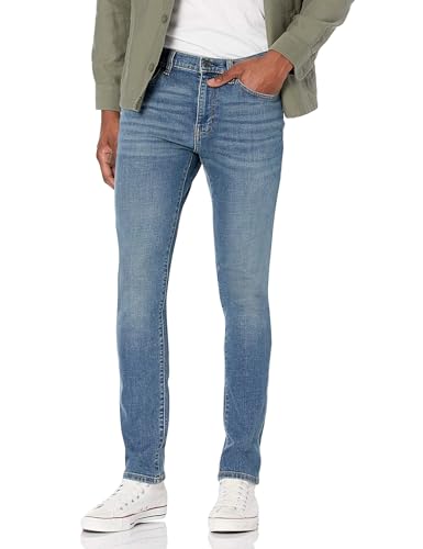 Amazon Essentials Pantalón Vaquero Elástico de Ajuste Ceñido - colores interrumpidos Hombre, Azul Medio Vintage, 29W / 32L